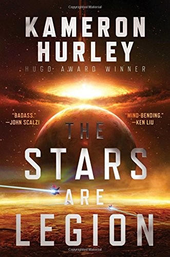 Cover of the Saga Press hardcover edition of The Stars Are Legion by Kameron Hurley, showing a fiery orange planet with two small spacecraft against a starfield, blurbed as badass and mind-bending